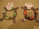 2 New Stretch Bracelets With Charms in Luke AFB, Arizona